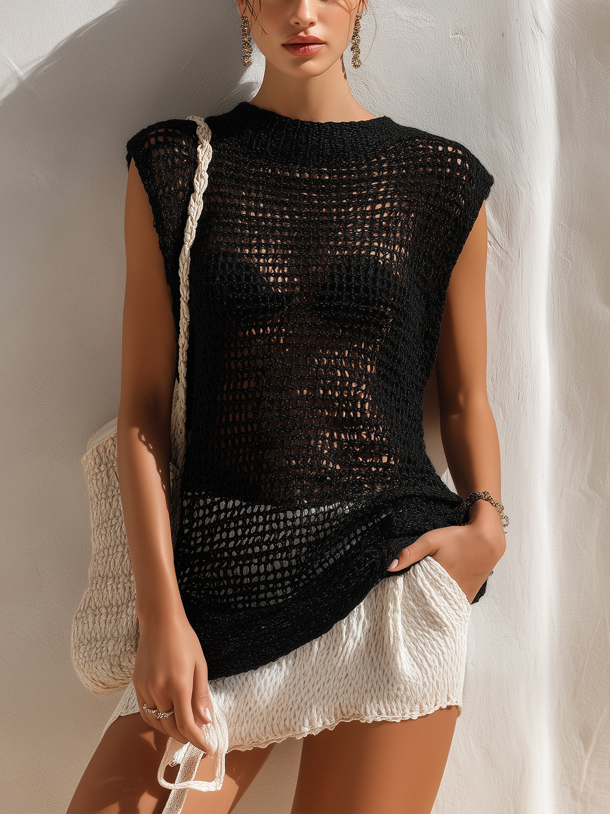 ElevenOra Chic Casual Black Round Neck Sleeveless Loose-Fit Hollow Breathable Knit Vest