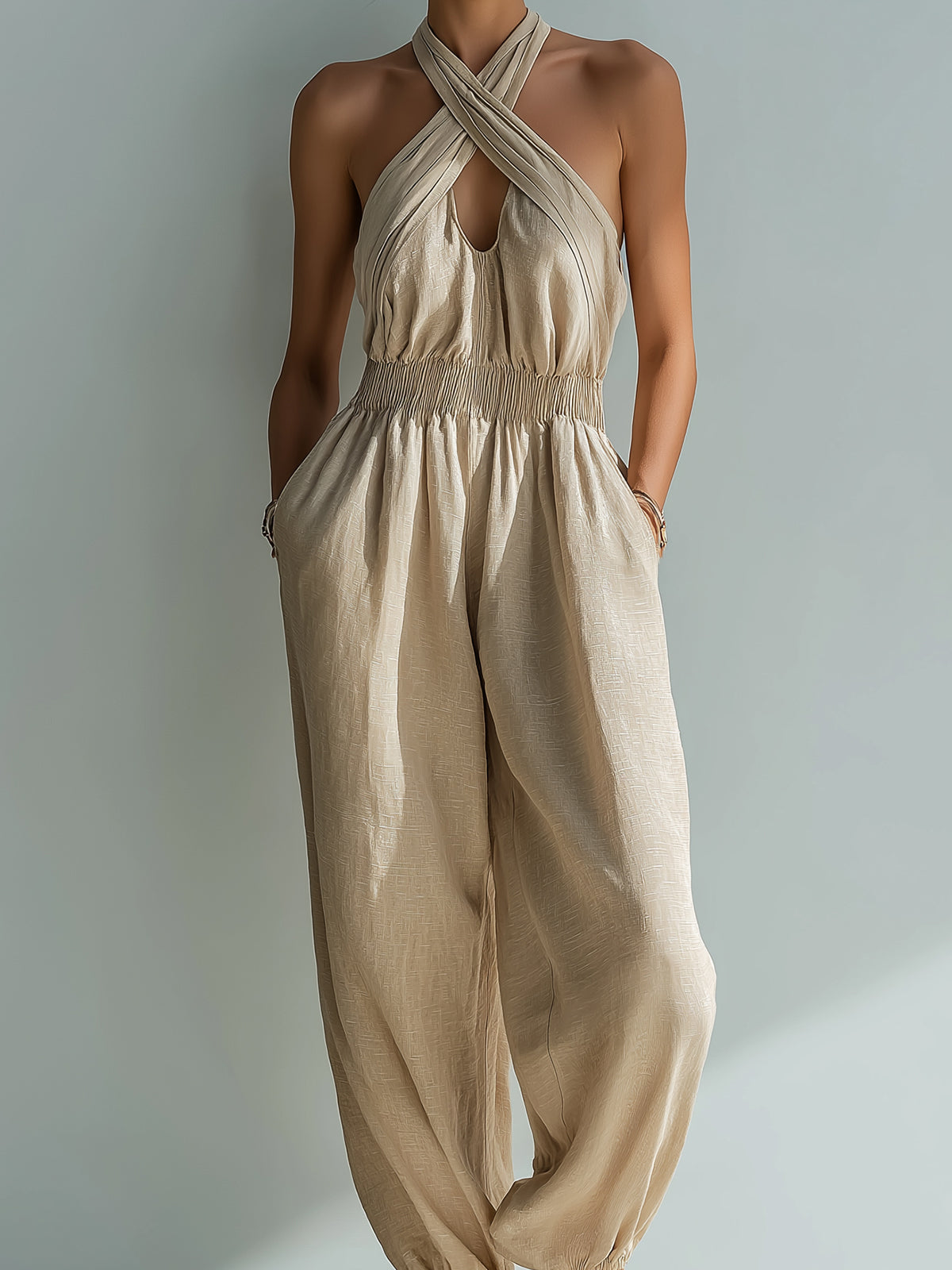 ElevenOra Chic Elegant Beige Linen Cross Halter-Neck Sleeveless Cutout Detail Elastic-Waist Loose-Fit Cuffed Jumpsuit
