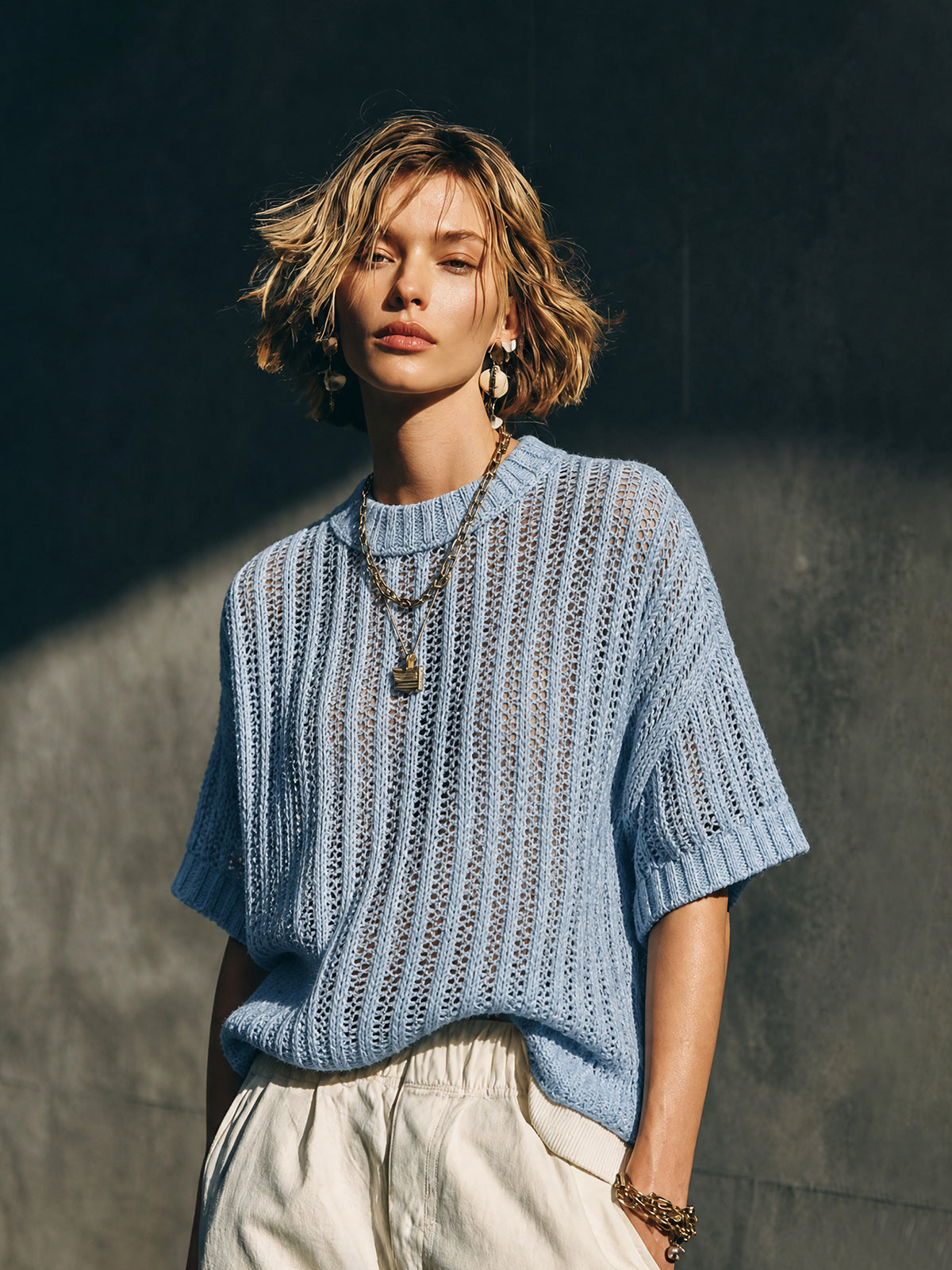 ElevenOra Chic Casual Light Blue Round Neck Half Sleeve Loose-Fit Vertical Hollow Rib Knit Sweater Top