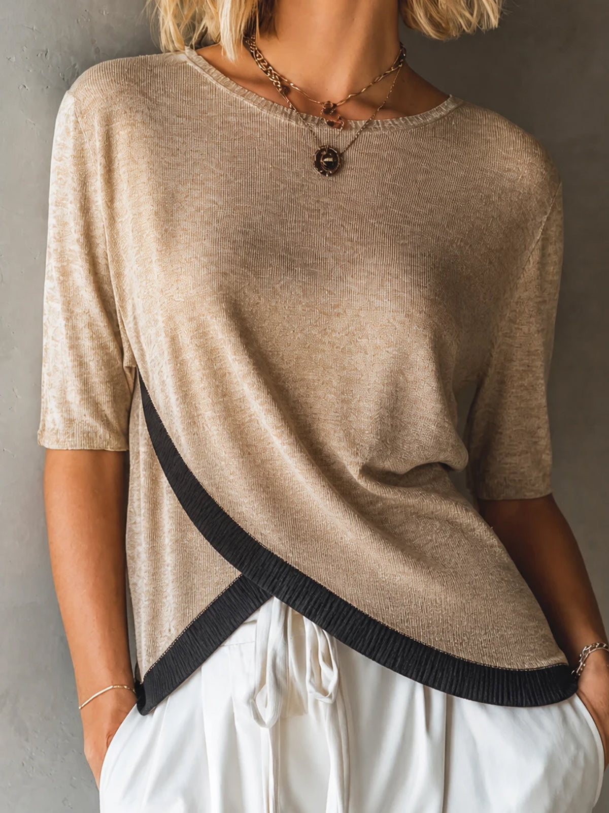 ElevenOra Chic Oat-Black Colorblock Round Neck Half Sleeve Asymmetric Cross Hem Loose-Fit Fine Knit Sweater Top