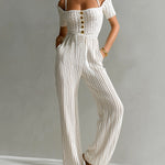 ElevenOra Chic Elegant White Off-The-Shoulder Square Neck Short-Sleeve Gold Button Detail Tailored Waist Wide Leg Crochet Ribbed Knit Jumpsuit