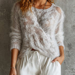 ElevenOra Chic White Rould-Neck Cross-Detail Long-Sleeve Loose-Fit Fuzzy Sweater Top