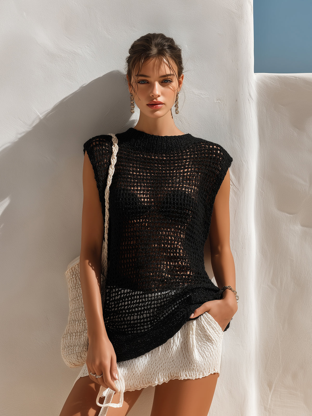 ElevenOra Chic Casual Black Round Neck Sleeveless Loose-Fit Hollow Breathable Knit Vest