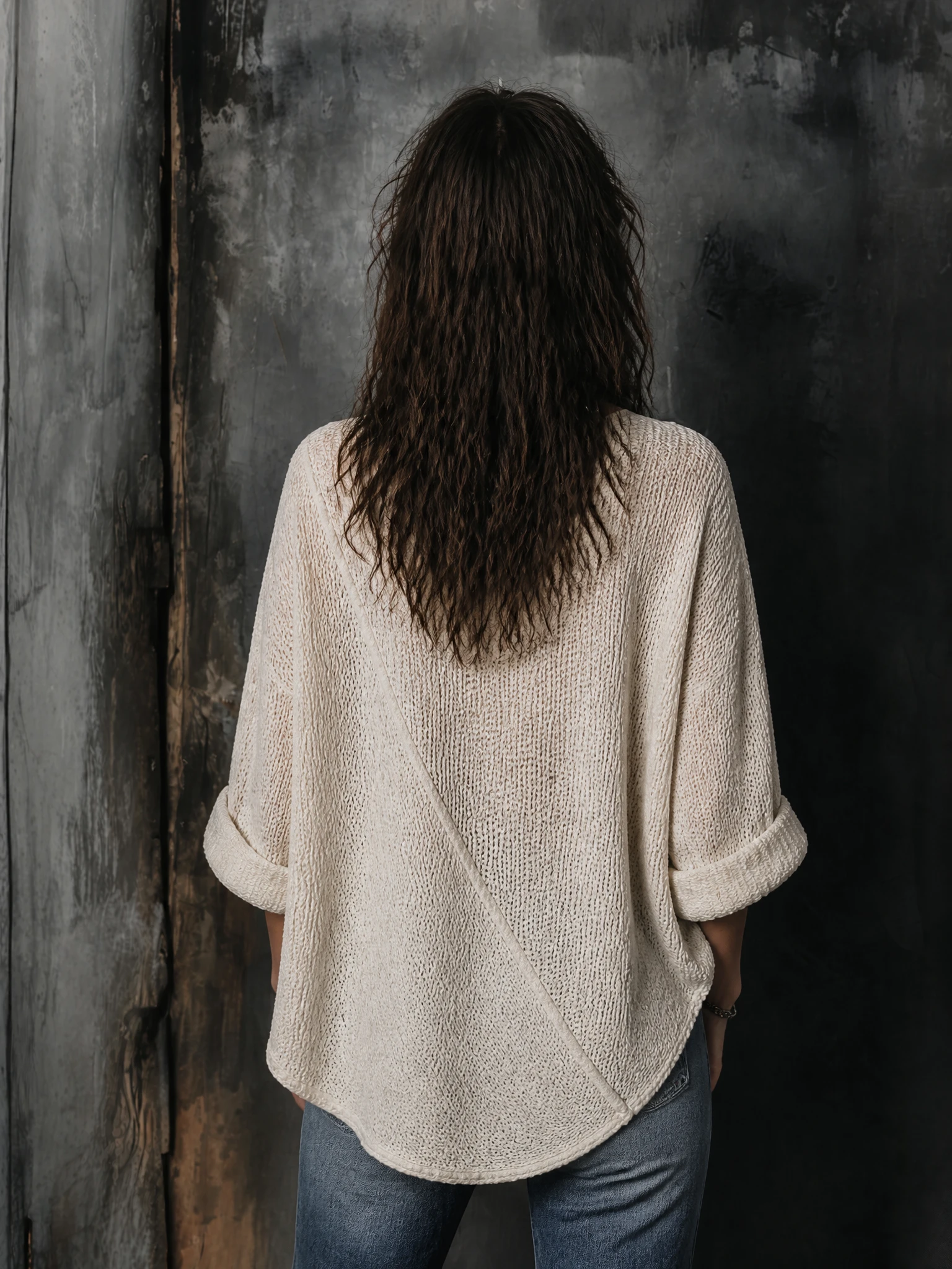 ElevenOra Chic Casual Off-White Round-Neck Dropped Shoulder Long Sleeves Asymmetric Hem Loose-Fit Knit Sweater Top